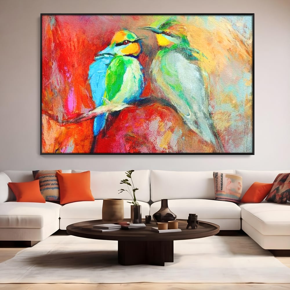 Tablou canvas cu tablou canvas cu doua pasari colorate pe creanga, in rama de aluminiu negru, pe perete intr-un living
